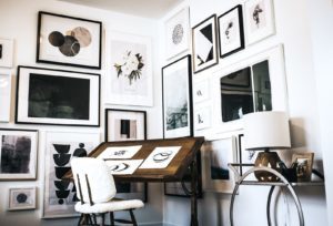 Office with sketching desk and gallery walls